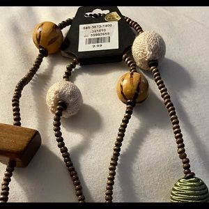 30 inch beaded necklace in green/brownish tones very light